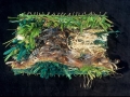 "Bird", woven fishhooks, gut, rafia, 12" x 8", 2002
